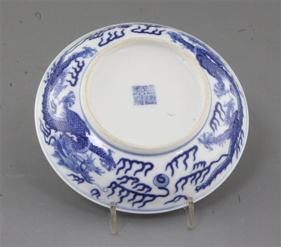 A Chinese blue and white dragon dish, diameter 16.3cm, some damage